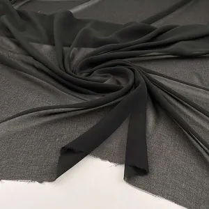 Flowing and falling transparent polyester voile